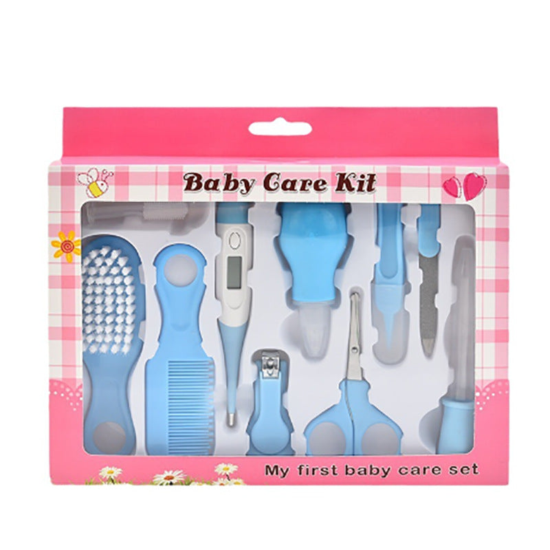 Baby care kit packaging with various tools on a pink and white checkered background