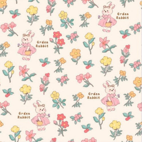 Magic Pet Wrap with pattern of cartoon bunnies and flowers on a white background