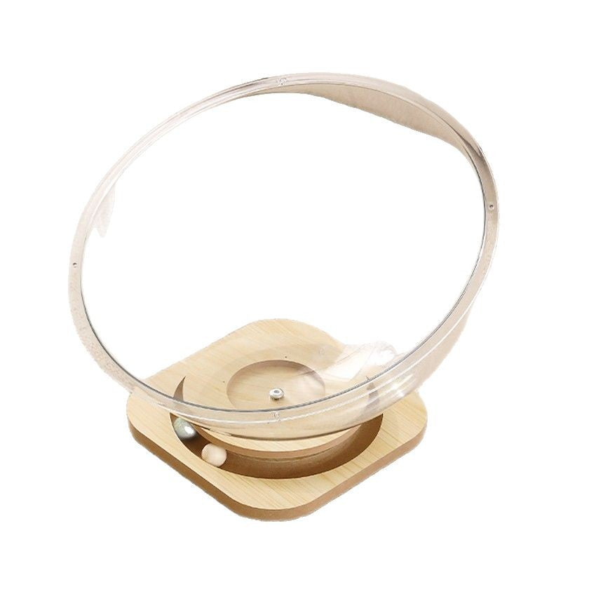 Clear glass Space Capsule Cat Bed on a wooden stand with a white background