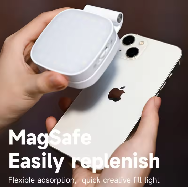 Hand holding a white electronic device next to an iPhone with 'MagSafe Easily replenish' text.